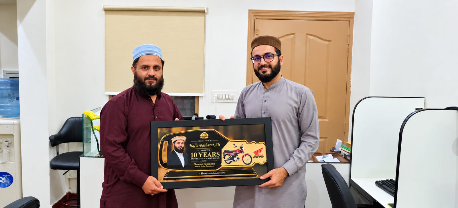 Hafiz Basharat Ali receiving appreciation for ten years of service